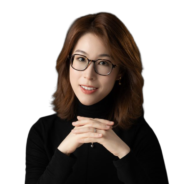 headshot of an asian woman with medium-length dark red hair and glasses